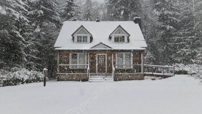 Old fashioned house in a snow storm