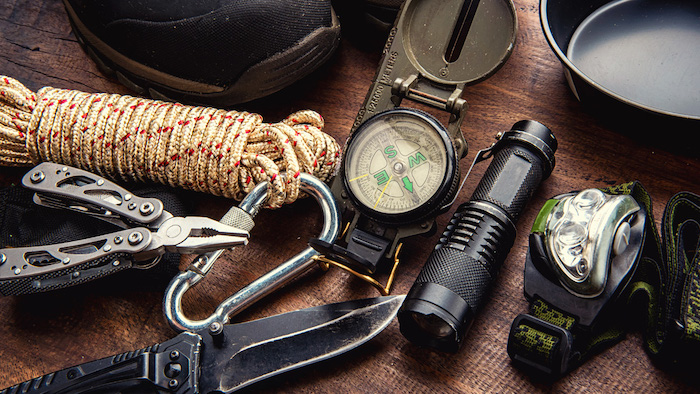 survival gear on a table