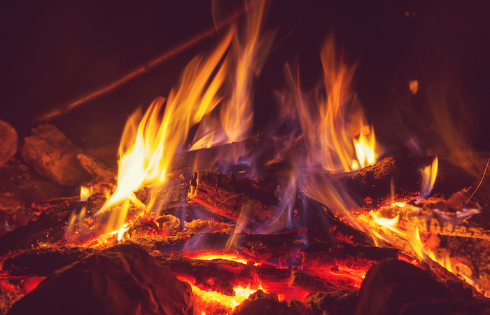 a roaring camp fire