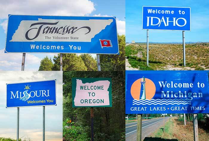 Highway road state signs for Tennessee, Idaho, Missouri, Oregon, and Michigan.